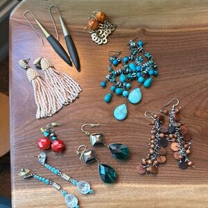 Eight sets of stylish earrings, earth, tones, and turquoise and a splash of red